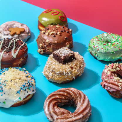 chocolate peppermint donuts with blue and red background